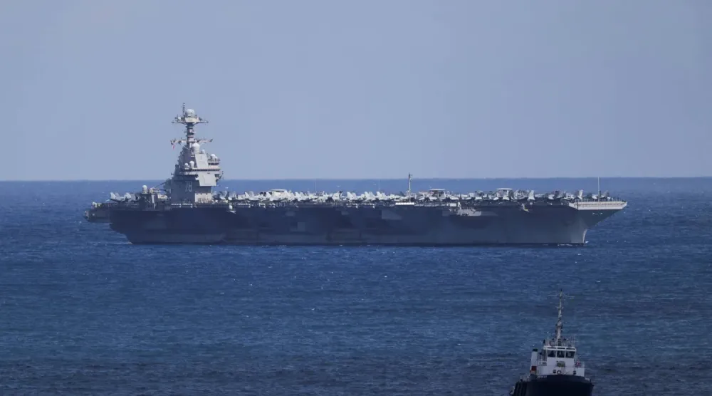 USS Gerald R. Ford uçak gemisi dün Girit adasının kuzeybatı kıyısındaki Souda Körfezi'nde bulunan deniz üssüne ulaştı (Reuters)