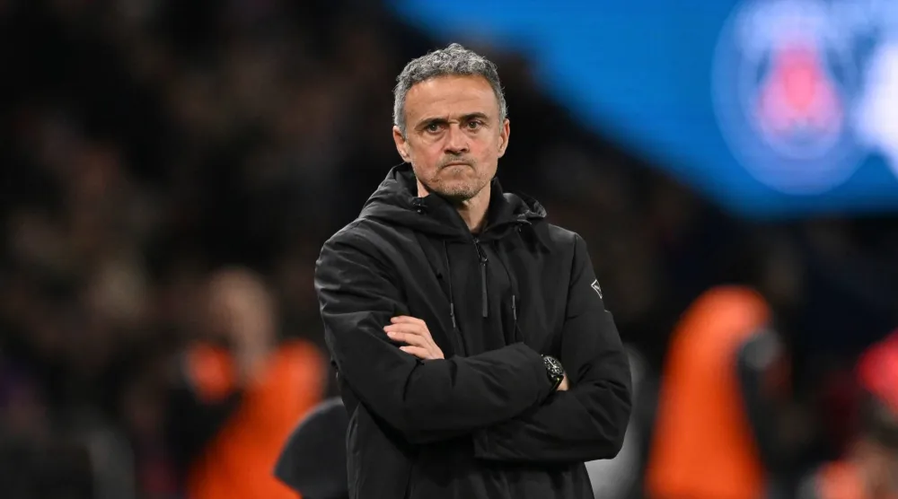 PSG's head coach Luis Enrique reacts during the French League One match between Paris Saint-Germain and Metz in Paris, France, Saturday, Feb. 21, 2026. (AP)