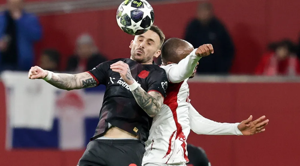 باير ليفركوزن تأهل بالتعادل مع أولمبياكوس (إ.ب.أ)