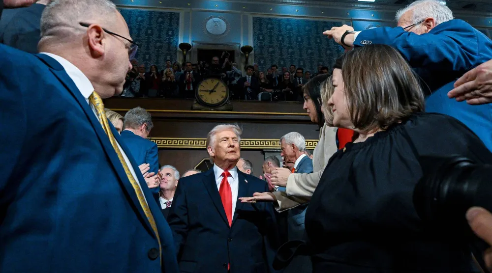 President Donald Trump enters to deliver the State of the Union address to a joint session of Congress in the House chamber at the US Capitol in Washington, Tuesday, Feb. 24, 2026. (Kenny Holston/The New York Times via AP, Pool)