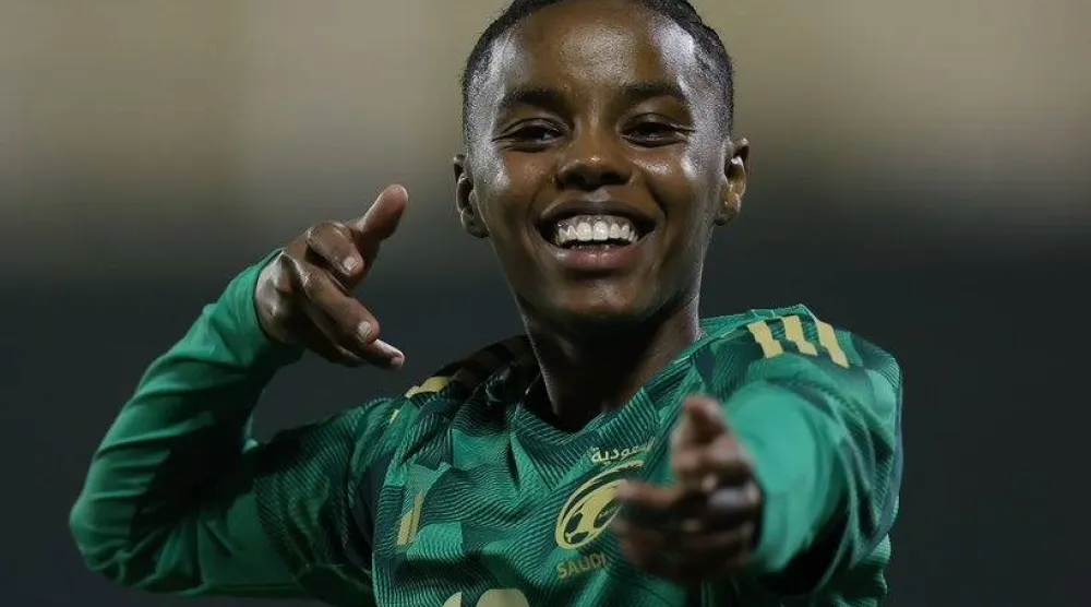 اللاعبة فدوى خالد تحتفل بهدفها في شباك البحرين (الشرق الأوسط)