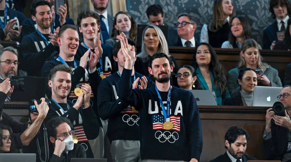المنتخب الأميركي للهوكي خلال استقبال ترمب (أ.ف.ب)
