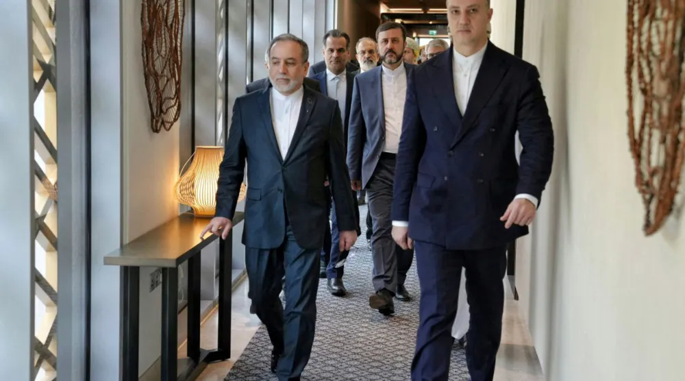 Iranian Foreign Minister Abbas Araqchi and his accompanying delegation depart for the site of the talks in Muscat, Oman, February 6, 2026. Iranian Foreign Ministry/WANA (West Asia News Agency)/ Handout via Reuters 