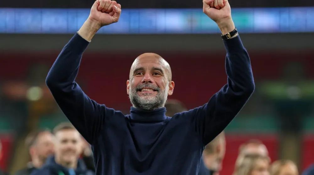 Pep Guardiola, Lig Kupası'nı 5 kez kazanan ilk menajer olarak tarihe geçti (AP)