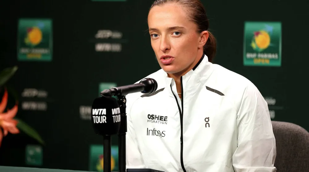 Iga Swiatek of Poland fields questions on media day during the BNP Paribas Open at the Indian Wells Tennis Garden on March 03, 2026 in Indian Wells, California. (Getty Images/AFP) 