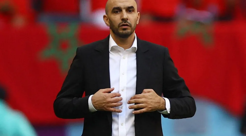 المدرب المغربي وليد الركراكي (رويترز)