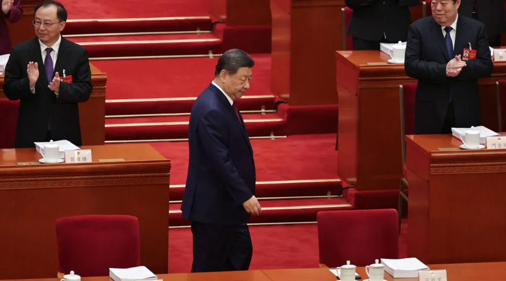 الرئيس الصيني شي جينبينغ خلال افتتاح المؤتمر السياسي الوطني بالبرلمان يوم الخميس (إ ب أ)