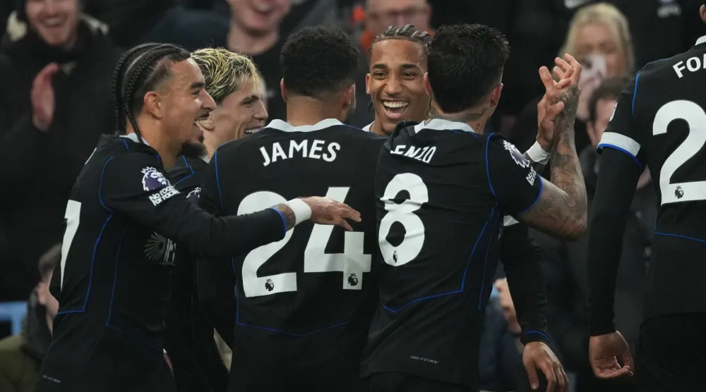  Chelsea's Joao Pedro, center, celebrates after scoring his side's fourth goal during the English Premier League soccer match between Aston Villa and Chelsea in Birmingham, England, Wednesday, March 4, 2026. (AP) 