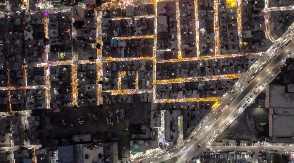 إفطار المطرية يمتد لعدة شوارع (صفحة الدكتور علاء فريد أحد المنظمين على «فيسبوك»)