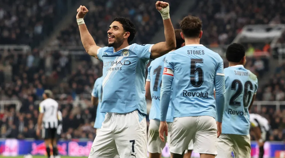 مرموش محتفلا بهدفه الثاني (رويترز)