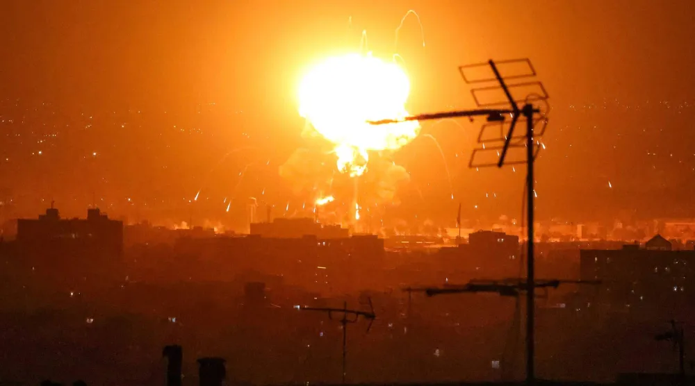 Explosions erupt following strikes in Tehran on March 7, 2026. (Photo by ATTA KENARE / AFP)