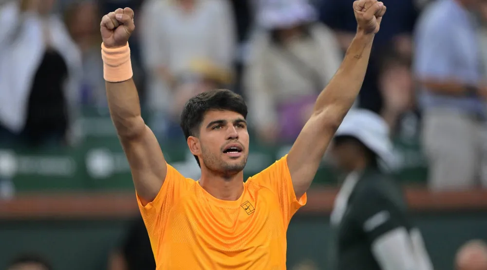 Mar 7, 2026; Indian Wells, CA, USA;  Carlos Alcaraz (ESP) reacts to the crowd after defeating Grigor Dimitrov (BUL) in his second round match during the BNP Paribas Open at the Indian Wells Tennis Garden. Mandatory Credit: Jayne Kamin-Oncea-Imagn Images