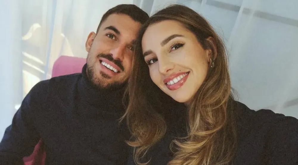 داني سيبايوس لاعب ريال مدريد وزوجته لونا سيرات (أس)