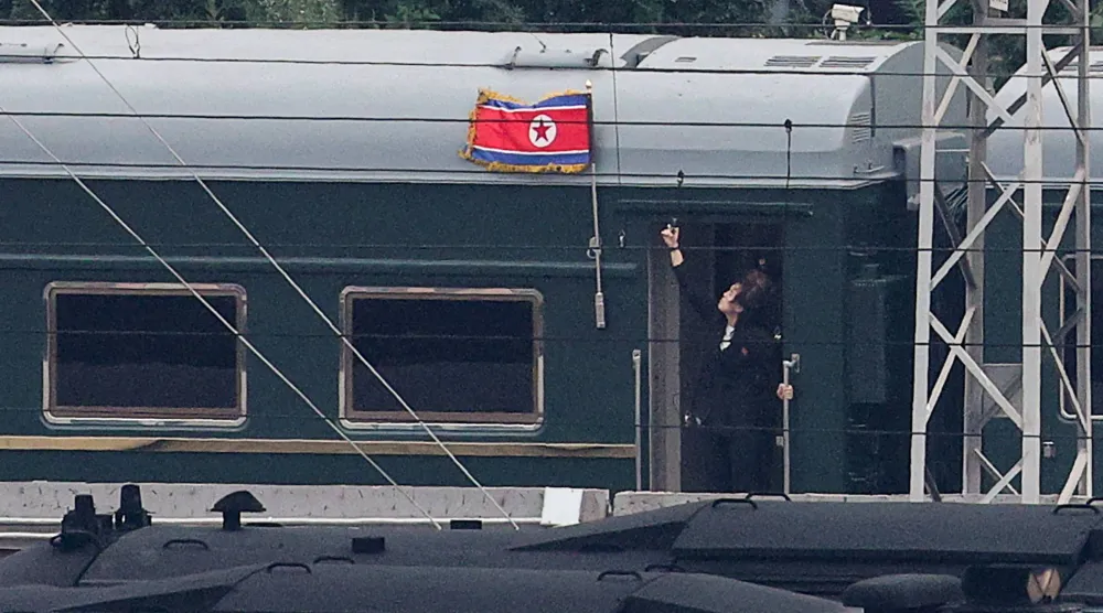 A North Korean flag flutters from a train believed to be carrying North Korean leader Kim Jong Un, as it arrives in Beijing, China, September 2, 2025. (Reuters)