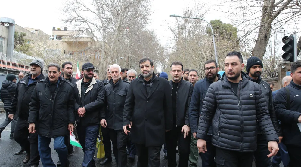 وزير الرياضة والشباب الإيراني أحمد دنيا مالي (في الوسط)  يشارك في مسيرة إحياء ذكرى «يوم القدس»... طهران 13 مارس 2026 (د.ب.أ)