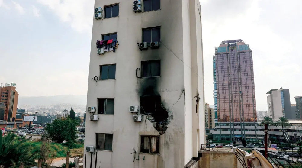 آثار غارة إسرائيلية استهدفت منطقة برج حمود يرقي بيروت (رويترز)