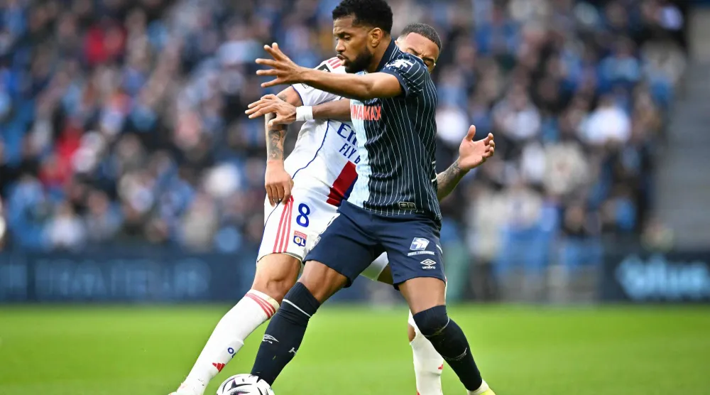 أولمبيك ليون اكتفى بالتعادل مع مضيّفه لوهافر (أ.ف.ب)