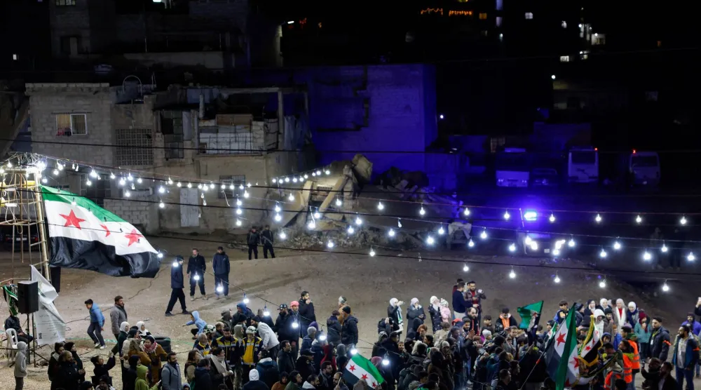 سوريون يتجمعون في دمشق في 15 مارس 2026 لإحياء ذكرى انتفاضة 2011 ضد بشار الأسد (رويترز)