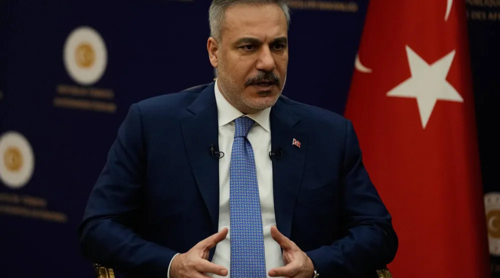 وزير الخارجية التركي هاكان فيدان (أ.ب)