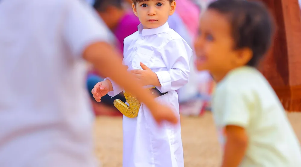 الأطفال أكثر افراد المجتمع فرائحية بالعيد – أرشيفية (تصوير: سعد الدوسري)