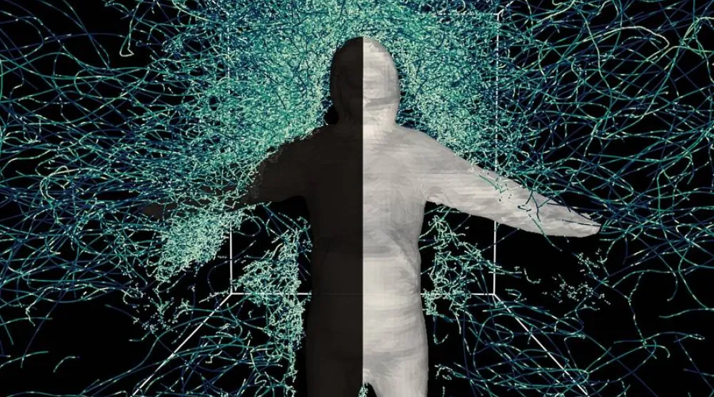 راقب الباحثون سلوك البعوض حول متطوع بشري كان يرتدي ملابس واقية سوداء من جهة وبيضاء من الجهة الأخرى (MIT)