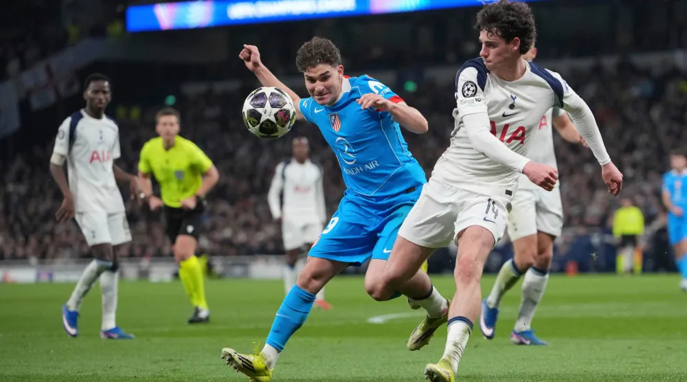 من المواجهة التي جمعت توتنهام وأتلتيكو مدريد في لندن (أ.ب)