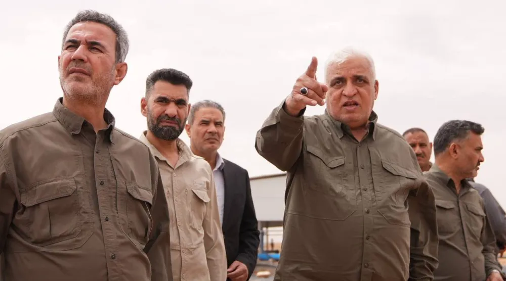 أرشيفية لرئيس «الحشد الشعبي» فالح الفياض ورئيس أركانه عبد العزيز المحمداوي (إعلام الهيئة)