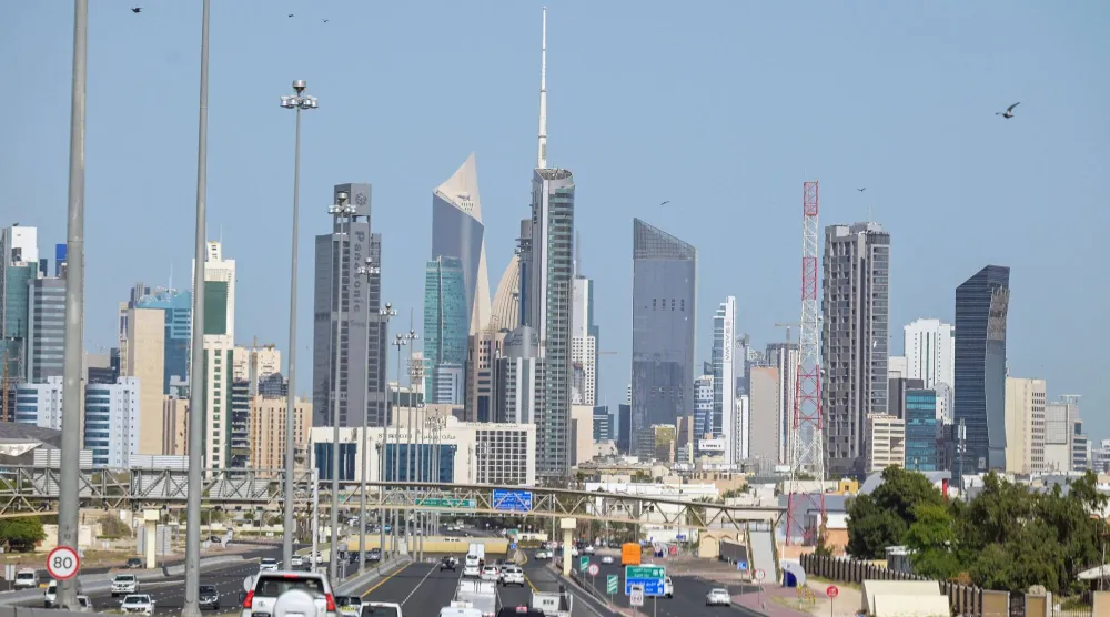 Vehicles drive along the highway leading to and from Kuwait City on March 2, 2026. (AFP)