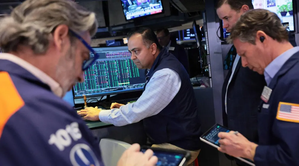 متداولون يعملون في بورصة نيويورك (أ.ف.ب)