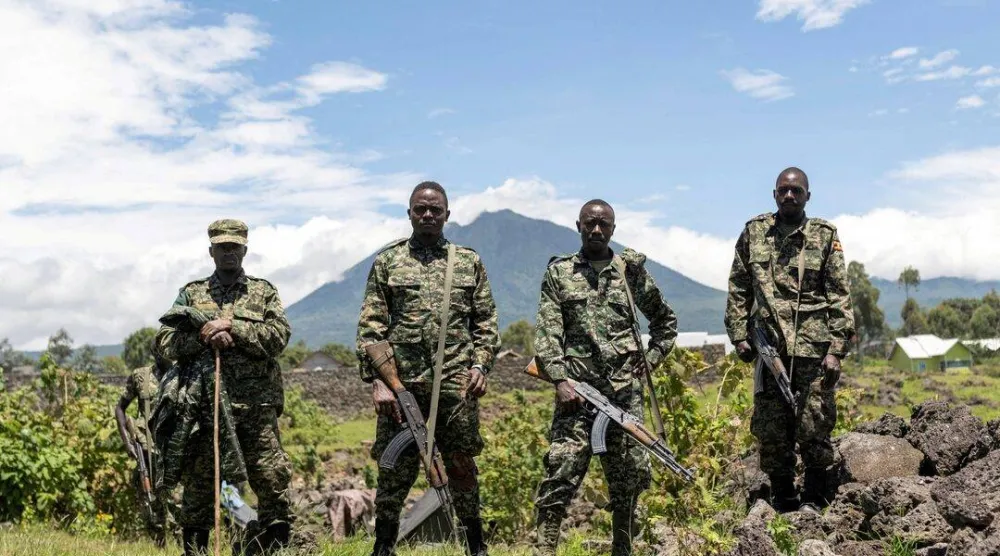 أفراد من الجيش الأوغندي ضمن قوات قوة شرق أفريقيا الإقليمية (رويترز)