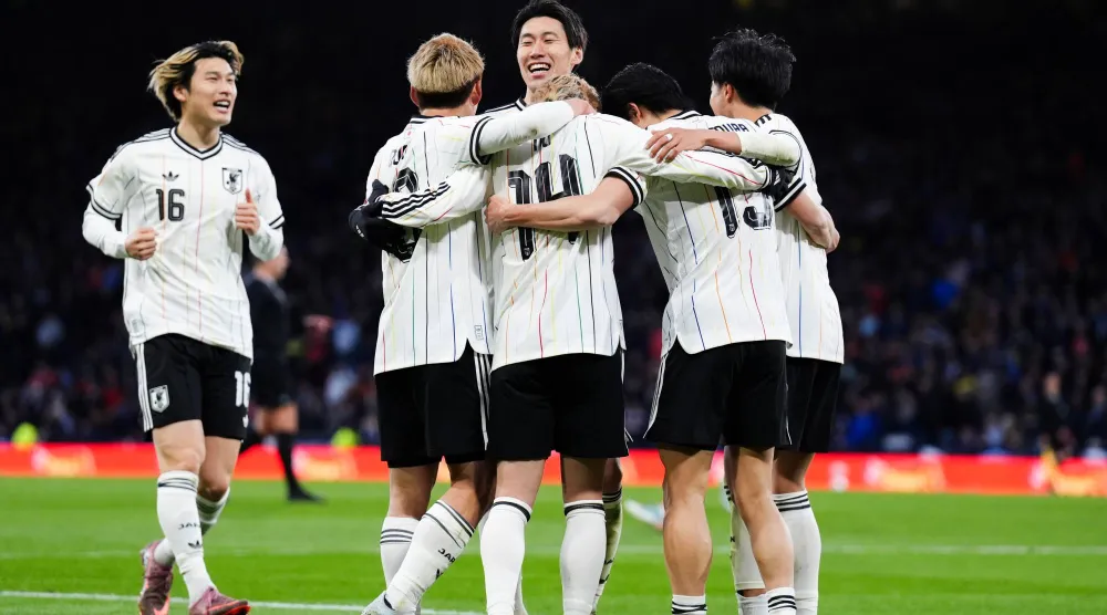 فرحة يابانية بهدف الفوز (د.ب.أ)