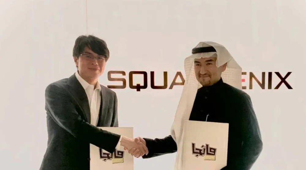 المدير العام رئيس تحرير «مانجا العربية» الدكتور عصام بخاري مع الرئيس والمدير التنفيذي لشركة «سكوير إنيكس» السيد تاكاشي كيريو (الشرق الأوسط)