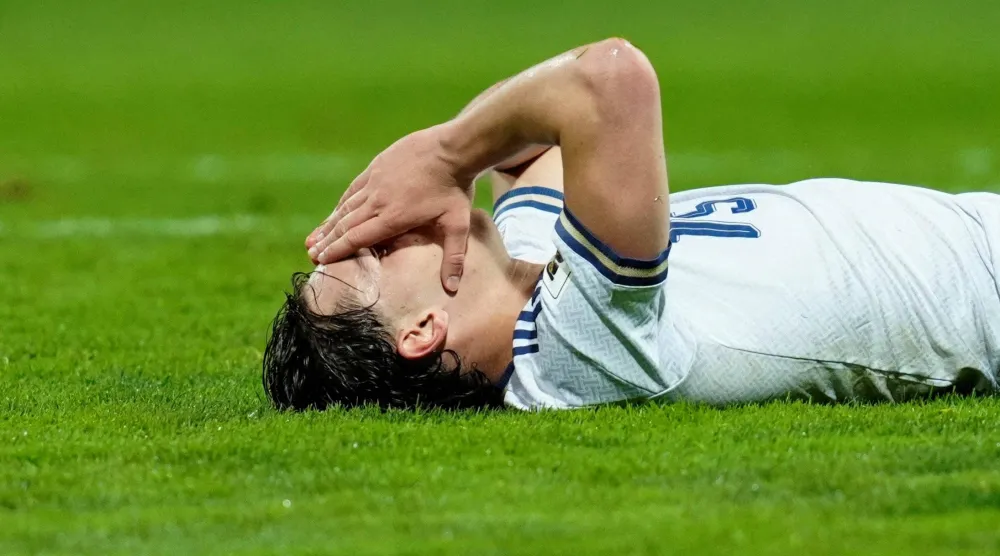 الحسرة تكفي هذه الصورة لمنتخب إيطاليا (رويترز)