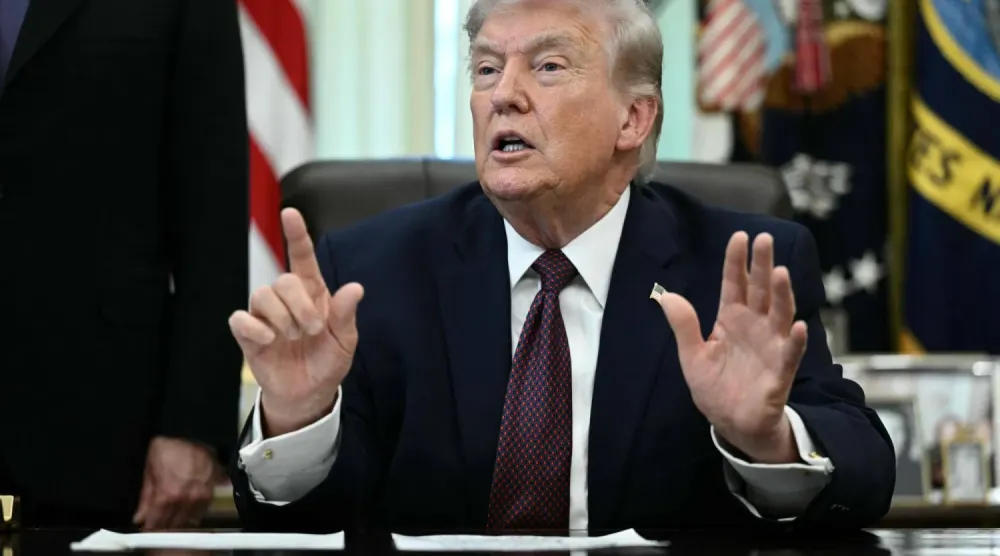 ABD Başkanı Donald Trump, Beyaz Saray'da gazetecilere konuşurken (AFP)