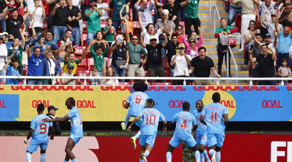 لاعبو الكونغو يحتفلون بالتأهل (إ.ب.أ)