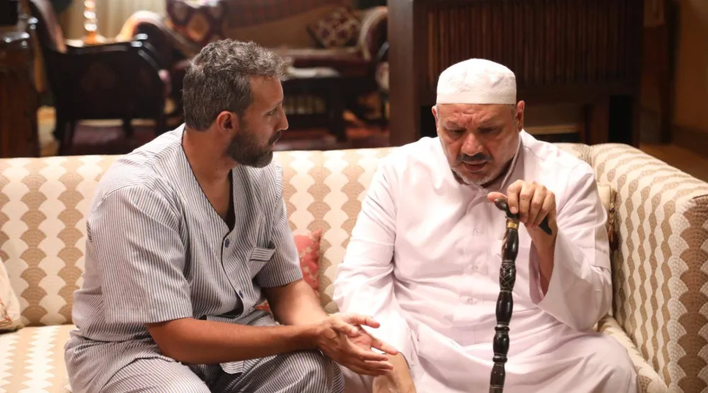 خالد الحربي وخالد يسلم في مشهد من الفيلم (الشرق الأوسط)