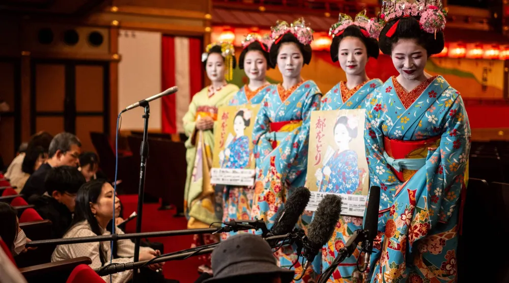  Maiko (apprentice geisha) take part in a press interview ahead a rehearsal for the annual "Miyako Odori" -- which means "capital city dance" in Japanese, at the Gion Kobu Kaburenjo in Kyoto on March 31, 2026. (AFP) 