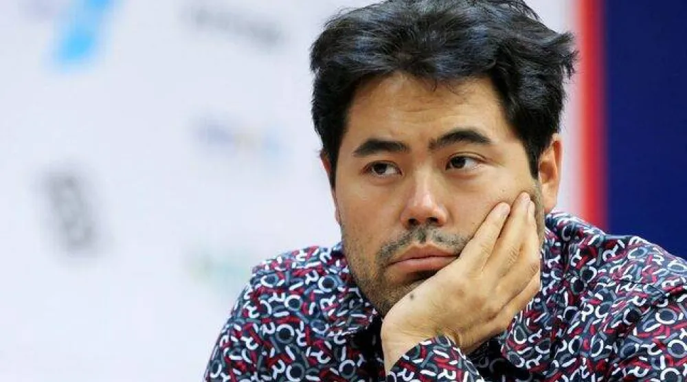 الأميركي هيكارو ناكامورا بطل الشطرنج (رويترز)