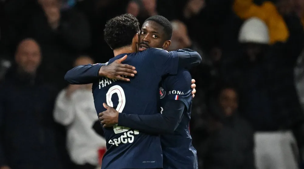 ديمبيلي محتفلاً بهدفه الأول (أ.ب)