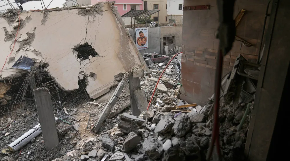 File photo: Destroyed houses that were hit in an Israeli airstrike in Saksakiyeh village, south Lebanon, Friday, April 3, 2026. (AP Photo/Hussein Malla)