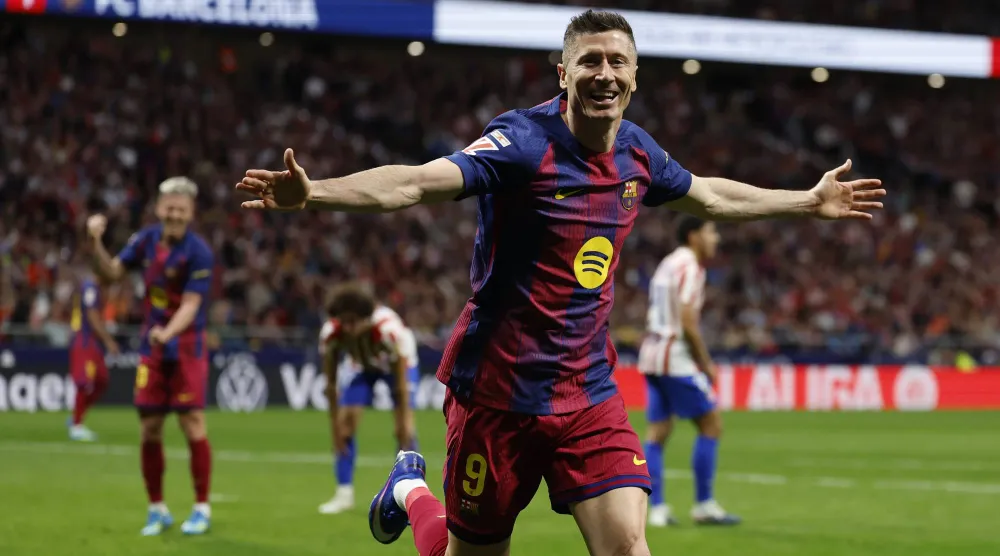 ليفاندوفسكي سجَّل هدف الفوز على أتلتيكو (إ.ب.أ)