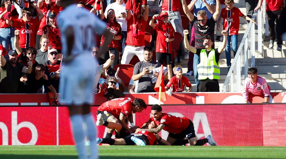 حسرة مدريدية على فرحة مايوركا (أ.ف.ب)