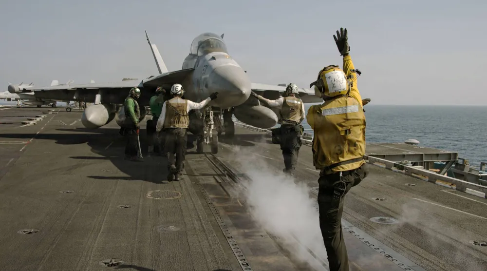 16 March 2026, Undisclosed location: A US Navy EA-18G Growler electronic warfare aircraft, assigned to the 'Wizards' of Electronic Attack Squadron 133, is signaled to hold for launch on the flight deck of the USS Abraham Lincoln during Operation Epic Fury on March 7, 2026. Photo: Navy /U.S. Navy/Planet Pix via ZUMA Press Wire/dpa