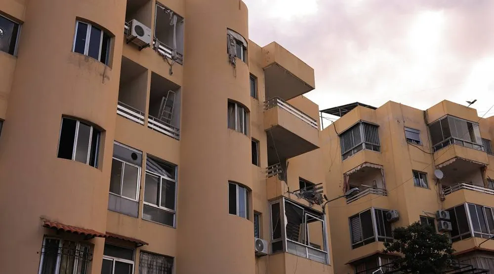  The exterior of an apartment building hit by an Israeli strike amid escalating hostilities between Israel and Hezbollah, as the US-Israel conflict with Iran continues, in Ain Saadeh, Lebanon, April 6, 2026. (Reuters)