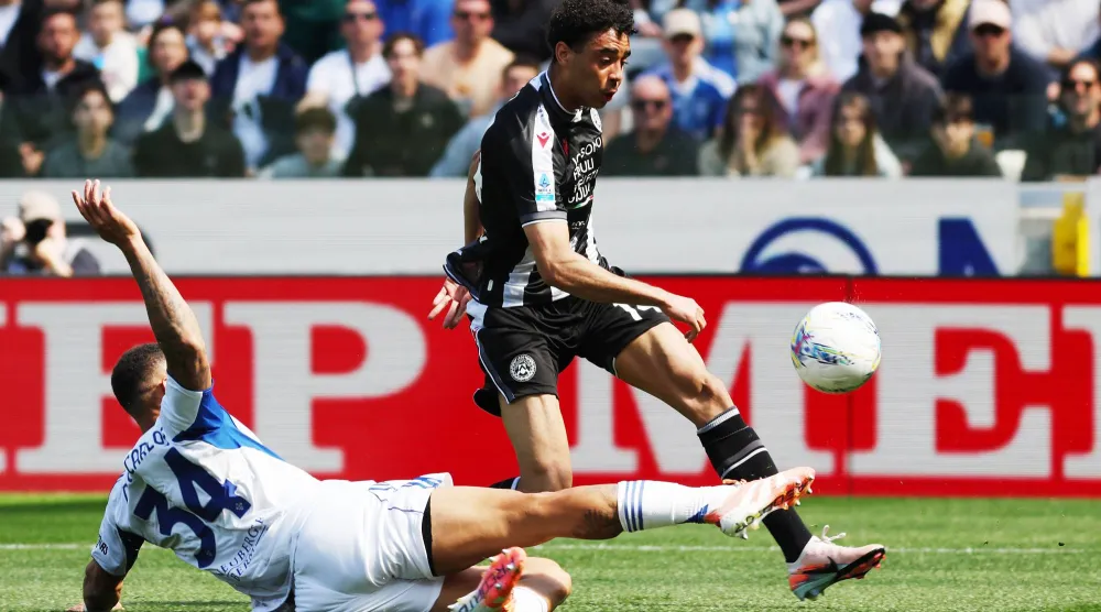 كومو عزز موقعه في المركز الرابع برصيد 58 نقطة (أ.ب)