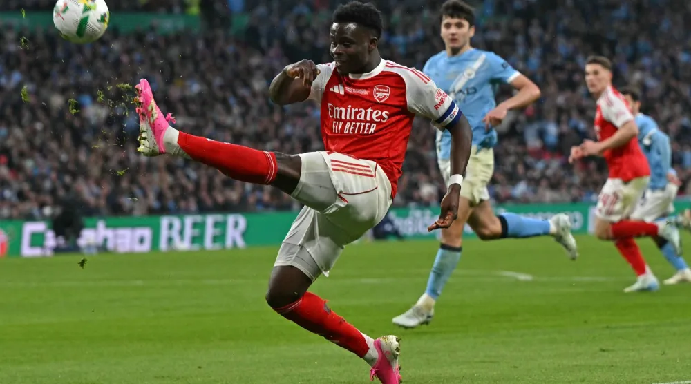 بوكايو ساكا خارج مواجهة آرسنال وسبورتنغ (أ.ف.ب)