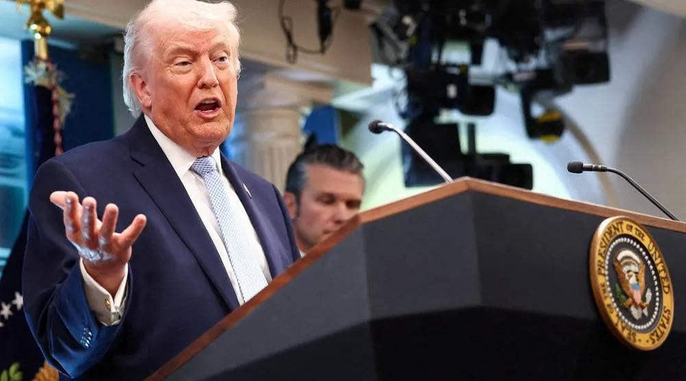US President Donald Trump, flanked by Secretary of Defense Pete Hegseth, speaks during a press conference in the James S. Brady Press Briefing Room at the White House in Washington, DC, US, April 6, 2026. (Reuters)
