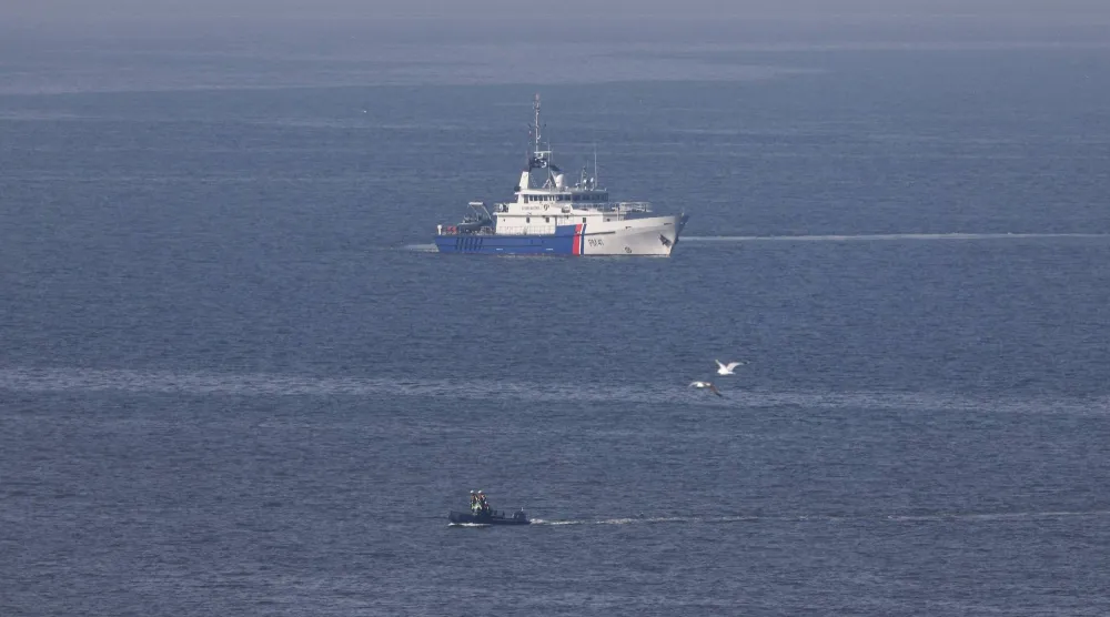 A vessel from the Maritime Affairs Department is sailing off France's Pas-de-Calais northern coastal city of Equihen-Plage after an attempt to cross the English Channel illegally turned tragic with several migrants found in cardiac arrest, on April 9, 2026. (Photo by Sameer AL-DOUMY / AFP)