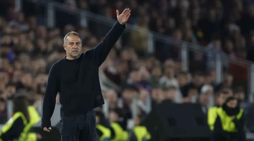 Barcelona's head coach Hansi Flick gestures during the UEFA Champions League quarter-final first leg match between FC Barcelona and Atletico Madrid, in Barcelona, Spain, 08 April 2026. (EPA)