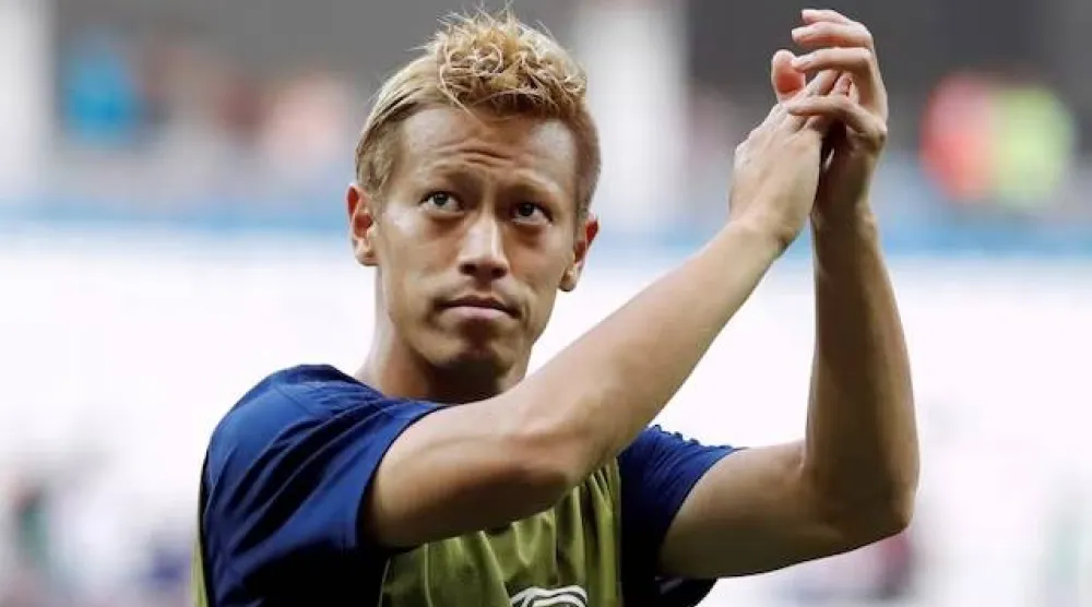 كيسوكي هوندا النجم السابق لميلان الإيطالي ومنتخب اليابان (رويترز)